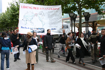 75. LYM marches down the street, holding the banner high